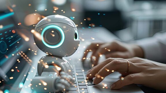 Eine Person, die über einen Chatbot mit einer künstlichen Intelligenz interagiert